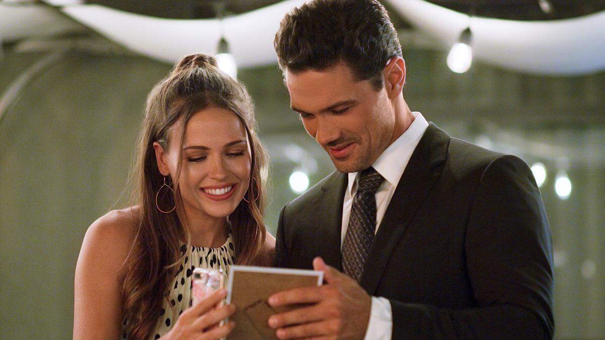 Jocelyn Hudon, left, and Ryan Paevey in the Hallmark movie “From Friend to Fiance.”