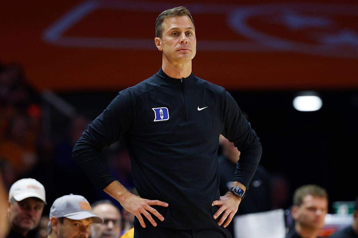 Head coach Jon Scheyer of the Duke Blue Devils looks on during the first half against the Tennessee Volunteers at Thompson-Boling Arena on October 26, 2025 in Knoxville, Tennessee.