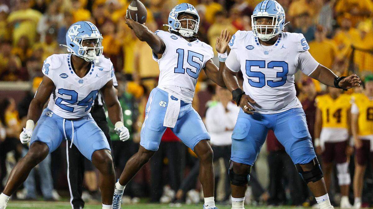 Aug 29, 2024; Minneapolis, Minnesota, USA; North Carolina Tar Heels quarterback Conner Harrell (15) throws the ball against the Minnesota Golden Gophers during the second half at Huntington Bank Stadium. Mandatory Credit: Matt Krohn-USA TODAY Sports