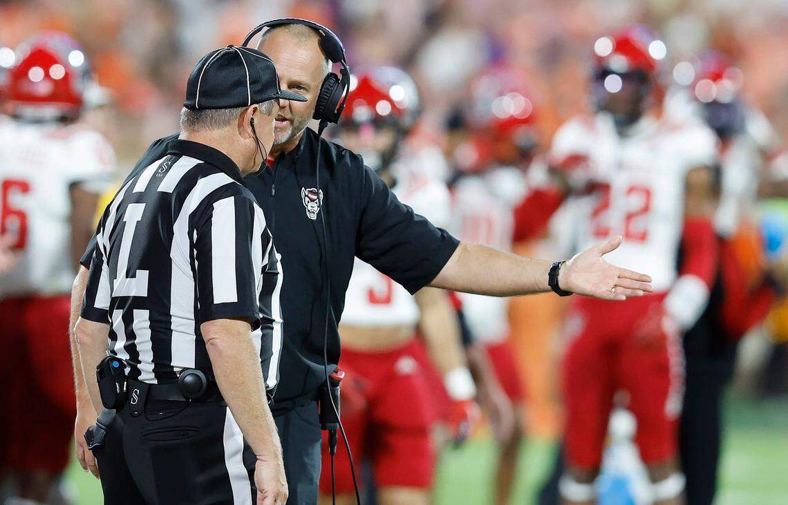 N.C. State head coach Dave Doeren argues a call during the first half of N.C. State’s game against Clemson at Memorial Stadium in Clemson, S.C., Saturday, Oct. 1, 2022.
