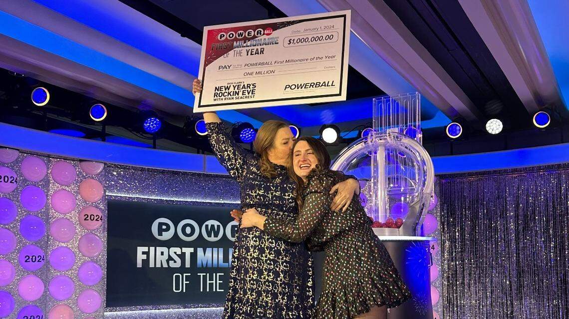 Pamela Bradshaw, left, of Clinton, N.C. (in Sampson County) celebrates with her daughter Joanna Hinson on “Dick Clark’s New Year’s Rockin’ Eve with Ryan Seacrest 2024” after winning $1 million and becoming the Powerball First Millionaire of the Year.