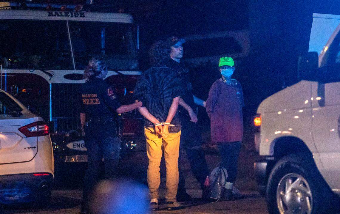 Police make arrests near Nash Square as demonstrators march and protest against systemic racism in downtown Raleigh Friday, Aug. 28, 2020 after the police shooting of Jacob Blake in Kenosha, WI.