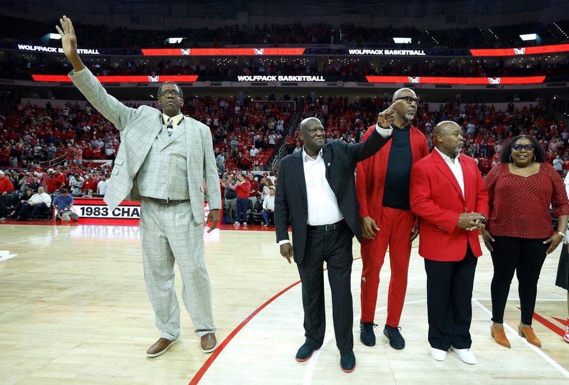 Members of the 1983 N.C. State national championship basketball team, including, from left, Cozell McQueen, Dereck Whittenburg, Thurl Bailey and Sidney Lowe are recognized during halftime of N.C. State’s game against Wake Forest at PNC Arena in Raleigh, N.C., Wednesday, Feb. 22, 2023.