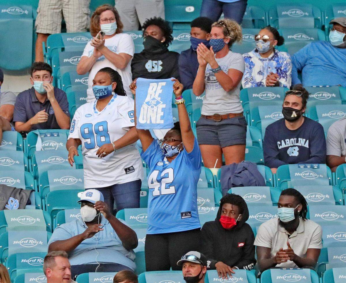 North Carolina Tar Heels fans watch as they play the Miami Hurricanes at Hard Rock Stadium In Miami Gardens, Florida, Saturday, December 12, 2020.