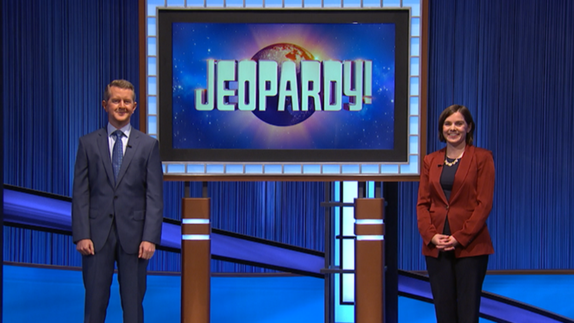 Kate Woomer-Deters, a legal services attorney from Raleigh, N.C., competes on “Jeopardy!” on Jan. 3, 2021. Pictured is host Ken Jennings.