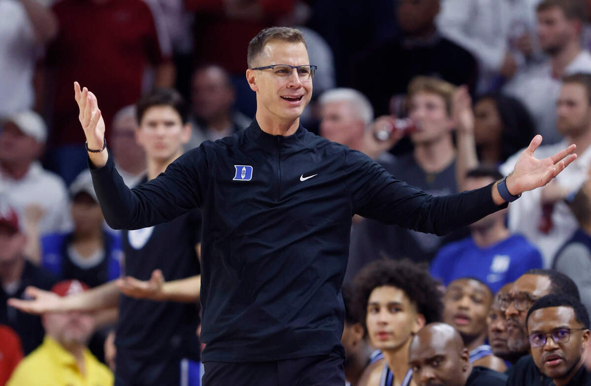 Duke’s head coach Jon Scheyer questions the call during the first half of Duke’s game against Arkansas at Bud Walton Arena in Fayetteville, Ark., Weds. Nov. 29, 2023.