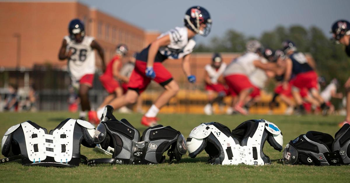 Apex Friendship football players work out on ‘No sweat Wednesdays’, a day without pads on September 11, 2019 in Apex, N.C. Coach Adam Sanders has instituted a no contact practice after a visit to Dartmouth, which uses a similar system. Apex Friendship has fewer injuries and players are in better shape to play at their potential on game nights.