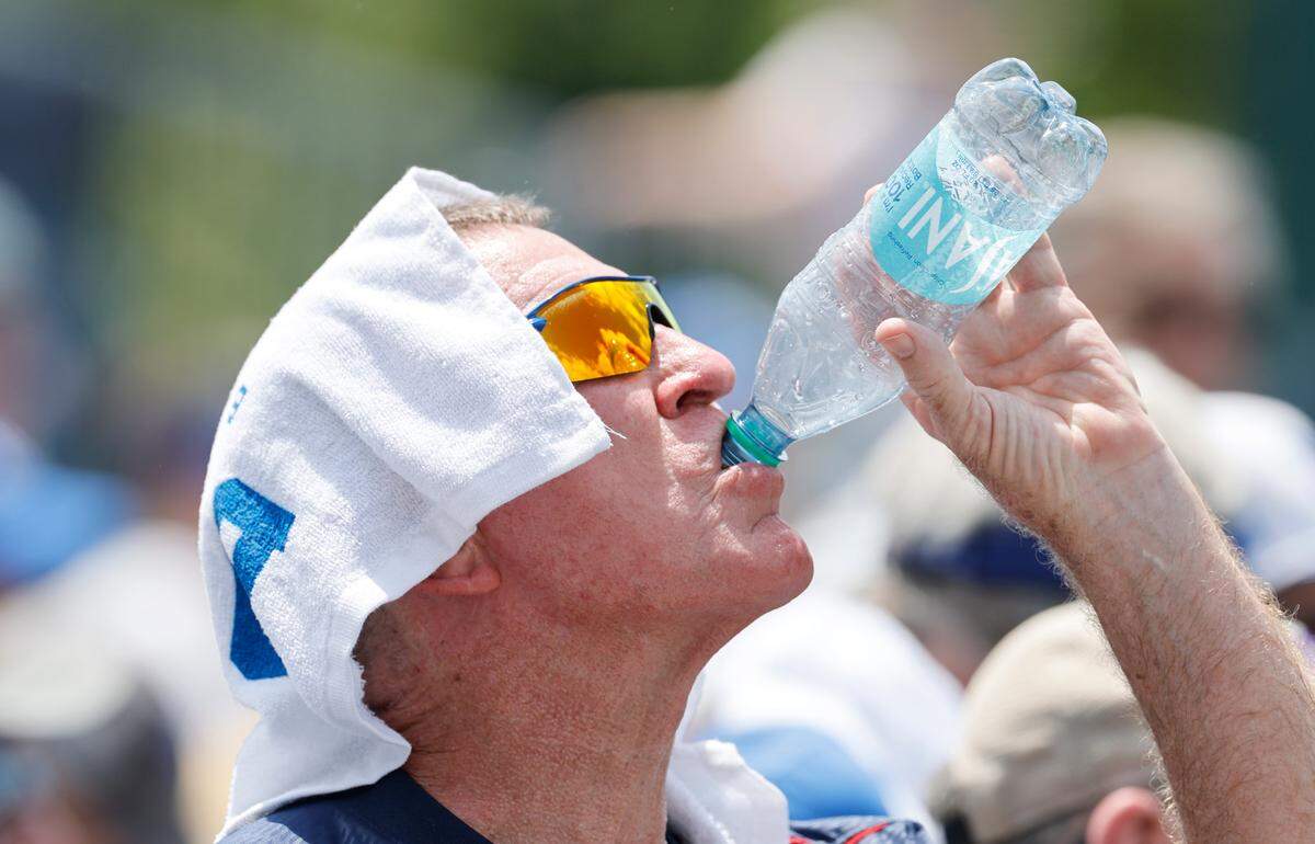 Duke fan Eddie Hall of Graham cools down during Duke’s game against Murray St. in the first game of Durham Super Regional at Jack Coombs Field in Durham, N.C., Sat. June 7, 2025.