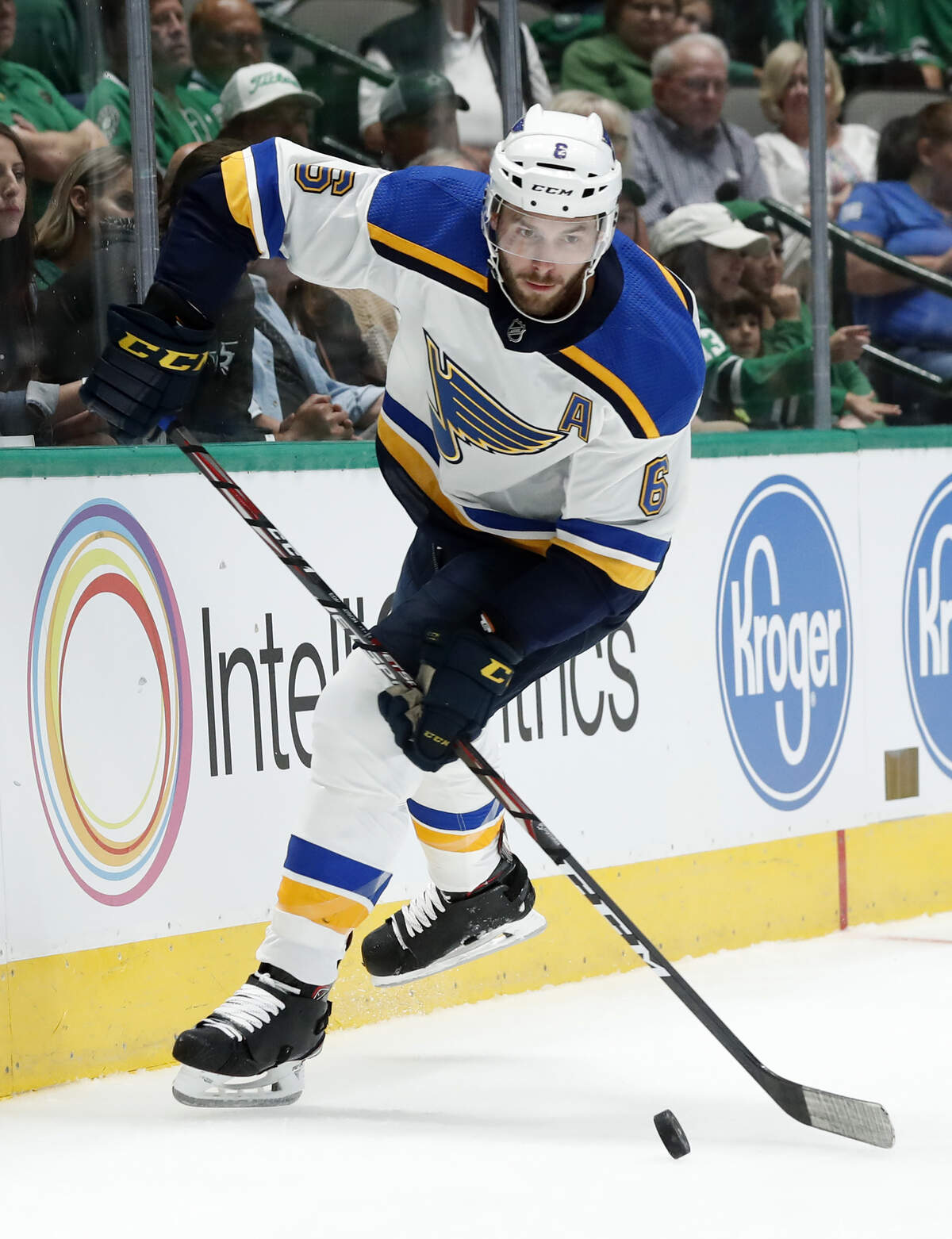 St. Louis Blues defenseman Joel Edmundson (6) moves to control thse puck in the first period of a preseason NHL hockey game against the Dallas Stars in Dallas, Monday, Sept. 16, 2019. (AP Photo/Tony Gutierrez)