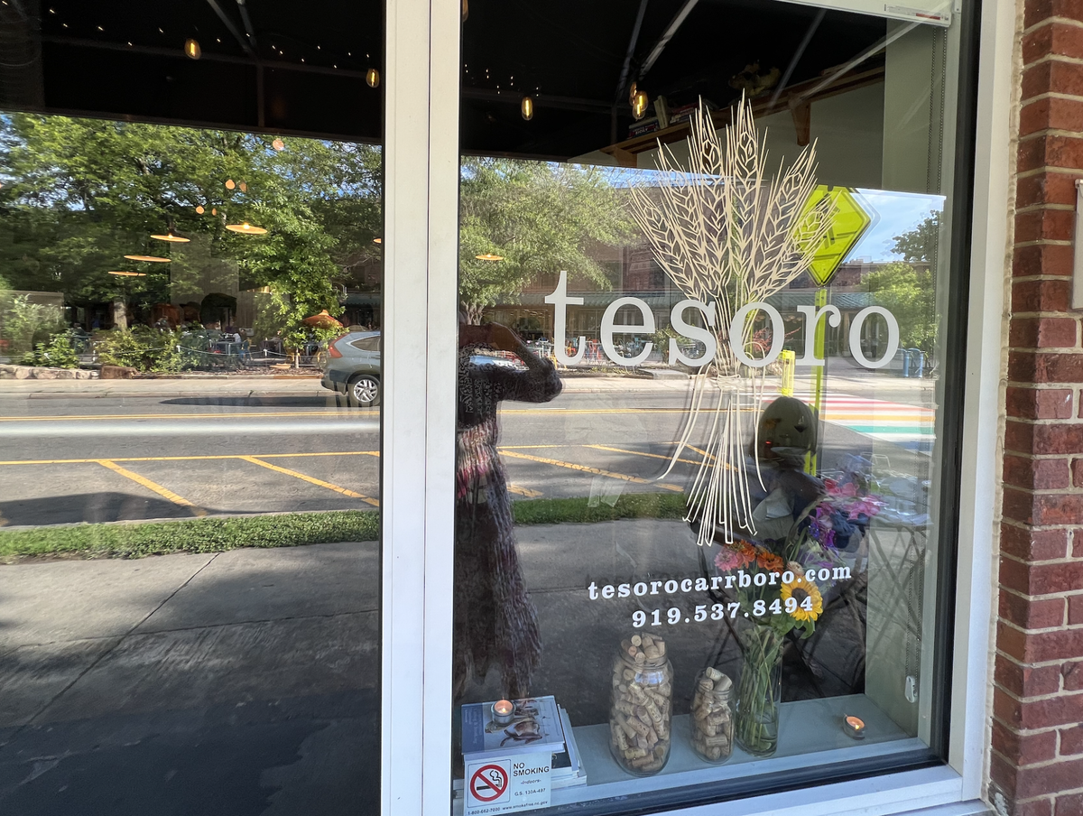 Tesoro’s vibe is casual and airy. As the sun sets, the dining room is bathed in a soft summer light. The restaurant opened in Carrboro, NC in 2021.