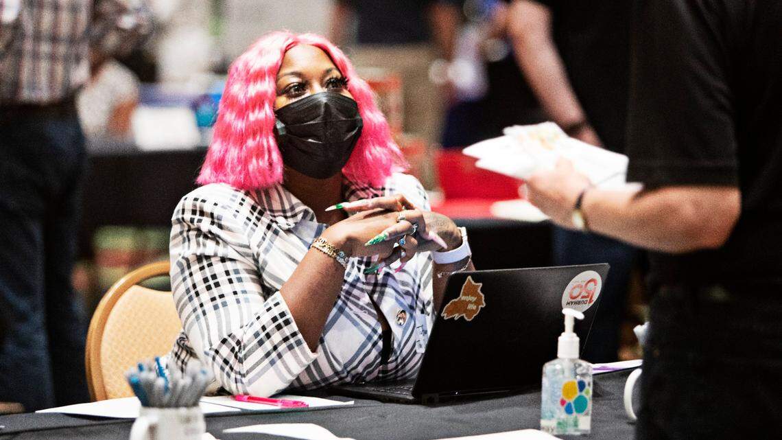 Tiffany Roach from The Durham Hotel meets with potential employees during the Durham Hospitality Job Fair at the Durham Convention Center on Tuesday, Aug. 31, 2021.