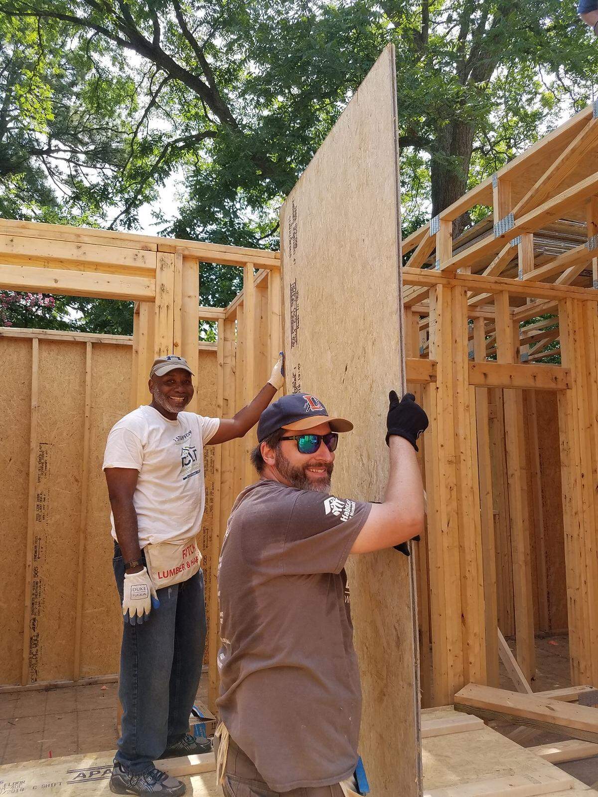 Durham Community Land Trust members help build affordable housing in Durham’s West End community.