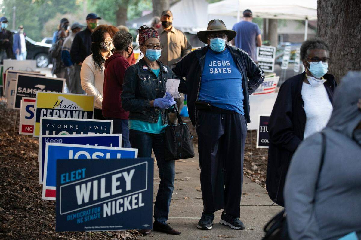 More than 350 people were in line to vote when the poll opened at 8 a.m., the first arriving was at 4:45 a.mm on Thursday, October 15, 2020 at Roberts Park in Raleigh, N.C. This was the first day of early voting in North Carolina.