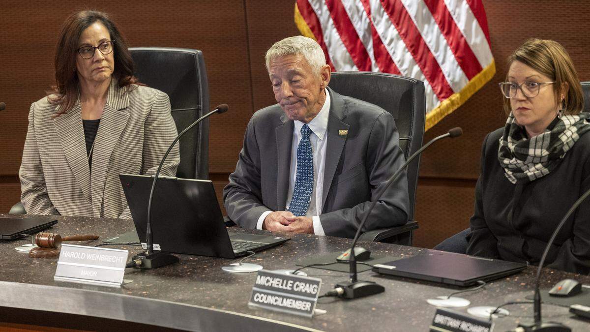 Cary Mayor Harold Weinbrecht, center, leads an emergency Cary Town Council meeting Monday, Dec. 15, 2025, at Cary Town Hall. 