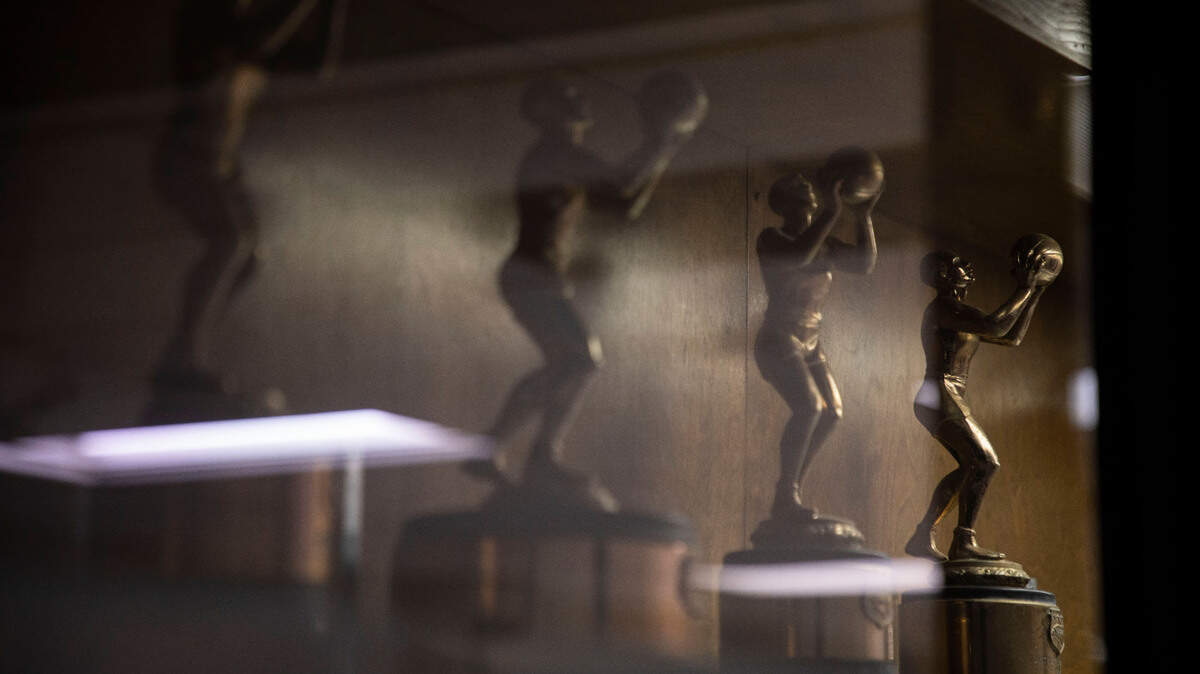 Trophies fill display cases in the halls outside of the basketball gym at Kinston High School, pictured here on Jan. 10, 2022.
