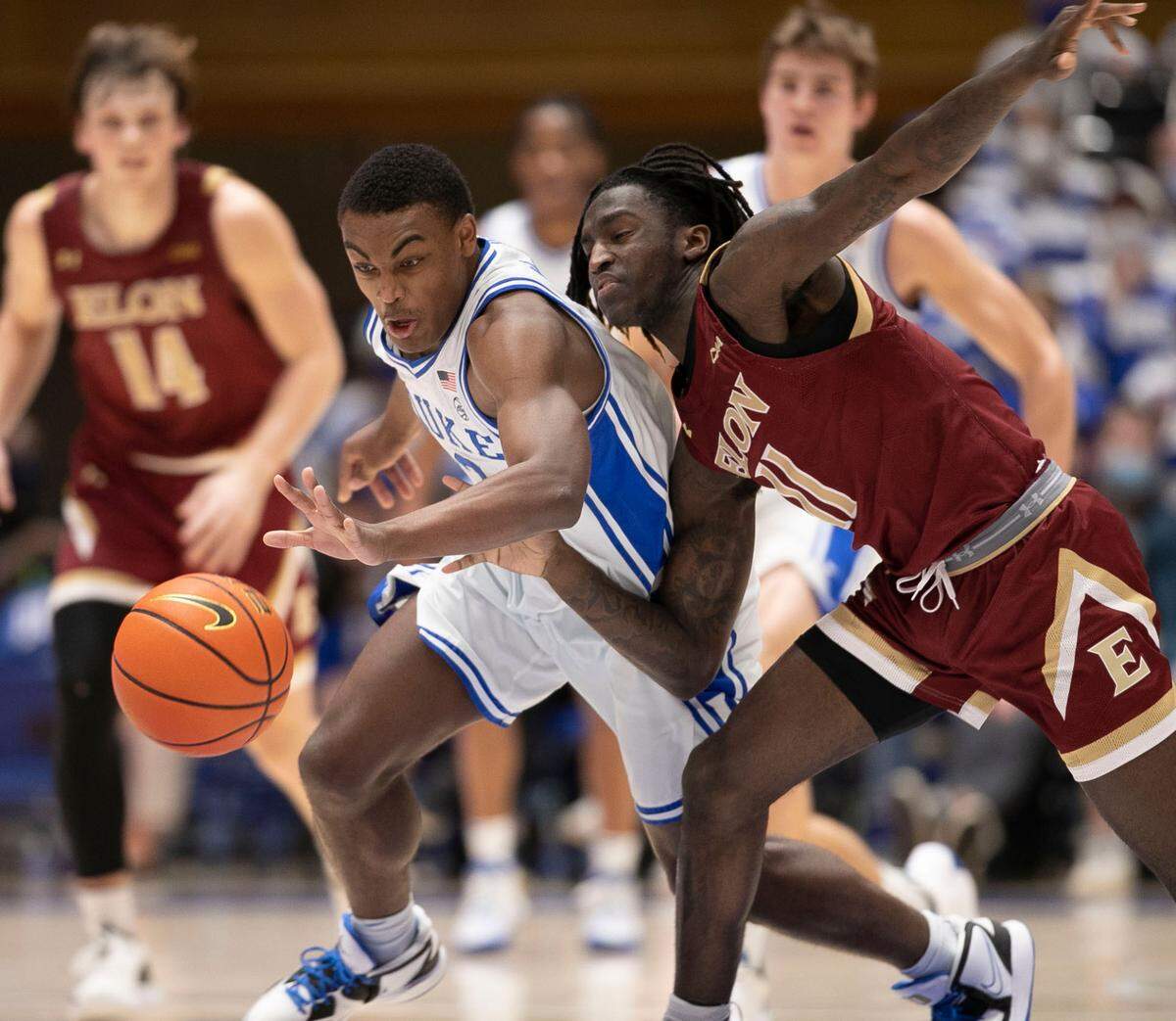 Duke’s Jaylen Blakes (2) makes a steal from Elon’s Hunter McIntosh (0) during the second half on Saturday, December 18, 2021 at Cameron Indoor Stadium in Durham, N.C.