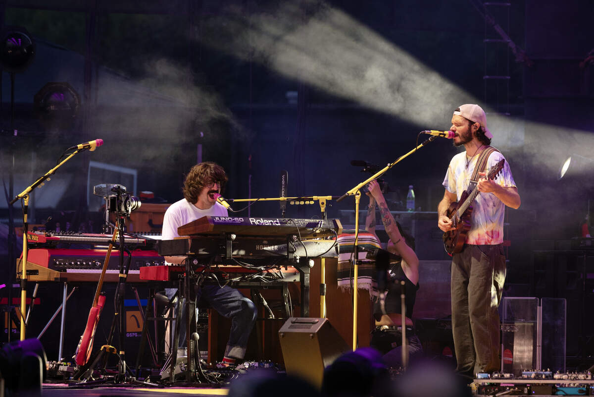 Peter Anspach (left) and Rick Mitarotonda whip up the crowd during the first set of Goose’s Friday night show in Raleigh.