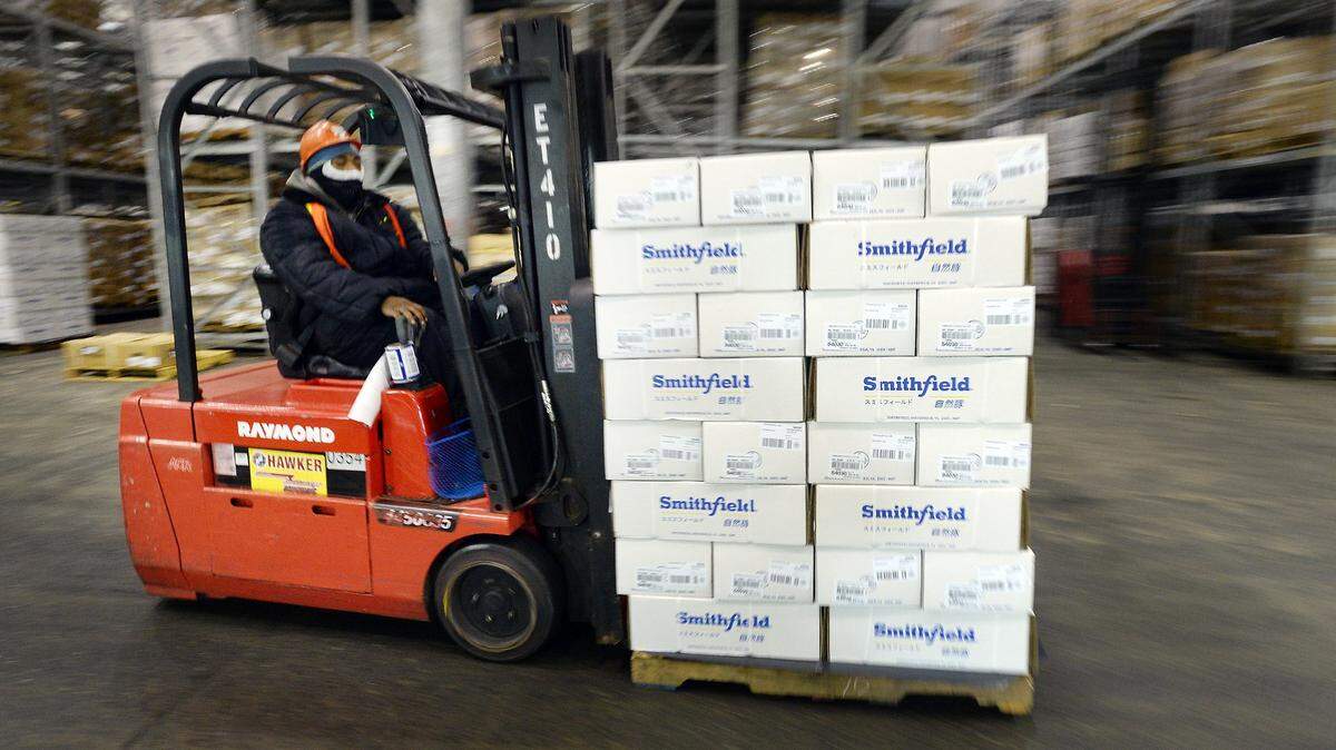 A forklift operator at the Smithfield Foods processing facility in Clinton in 2014. Smithfield Foods has filed a notice with the N.C. Department of Commerce saying it will close a distribution center in Clayton and lay off all workers there.