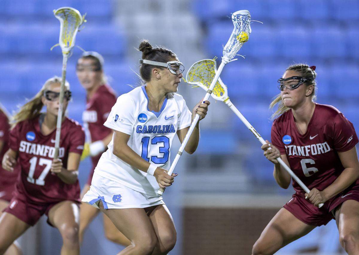 North Carolina midfielder Kate Levy works against Stanford defenseman Kaleigh Sommers (6) during their NCAA quarterfinal matchup on Thursday, May 14, 2026 at Dorrance Field in Chapel Hill, N.C. The Tar Heels defeated Stanford 14-11. 