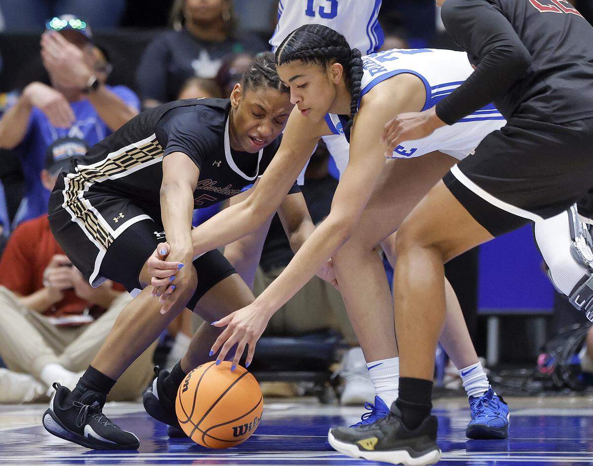 Duke’s Arianna Roberson battles for possession with College of Charleston’s Taryn Barbot and Grace Ezebilo during the first half of the Blue Devils’ 81-64 first-round NCAA Tournament win on Friday, March 20, 2026, at Cameron Indoor Stadium in Durham, N.C.