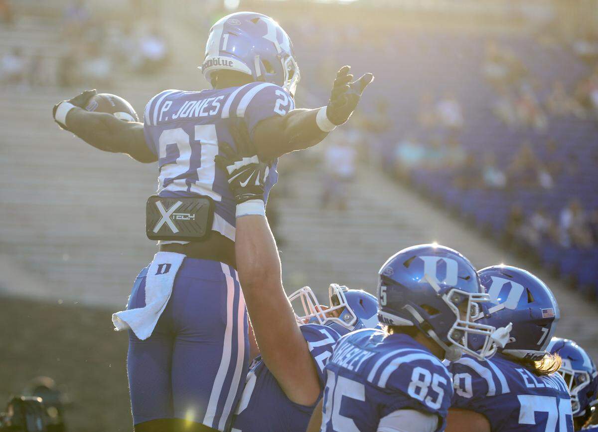 Duke’s Peyton Jones celebrates with teammates after scoring a touchdown during the second half of the Blue Devils’ 38-14 win over Northwestern on Saturday, Sept. 16, 2023, at Wallace Wade Stadium in Durham, N.C.