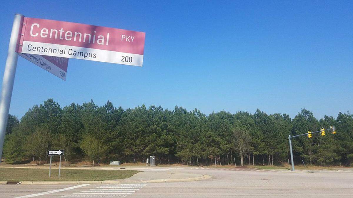 The view of Centennial Parkway from the Achievement Drive entrance to Centennial Campus.