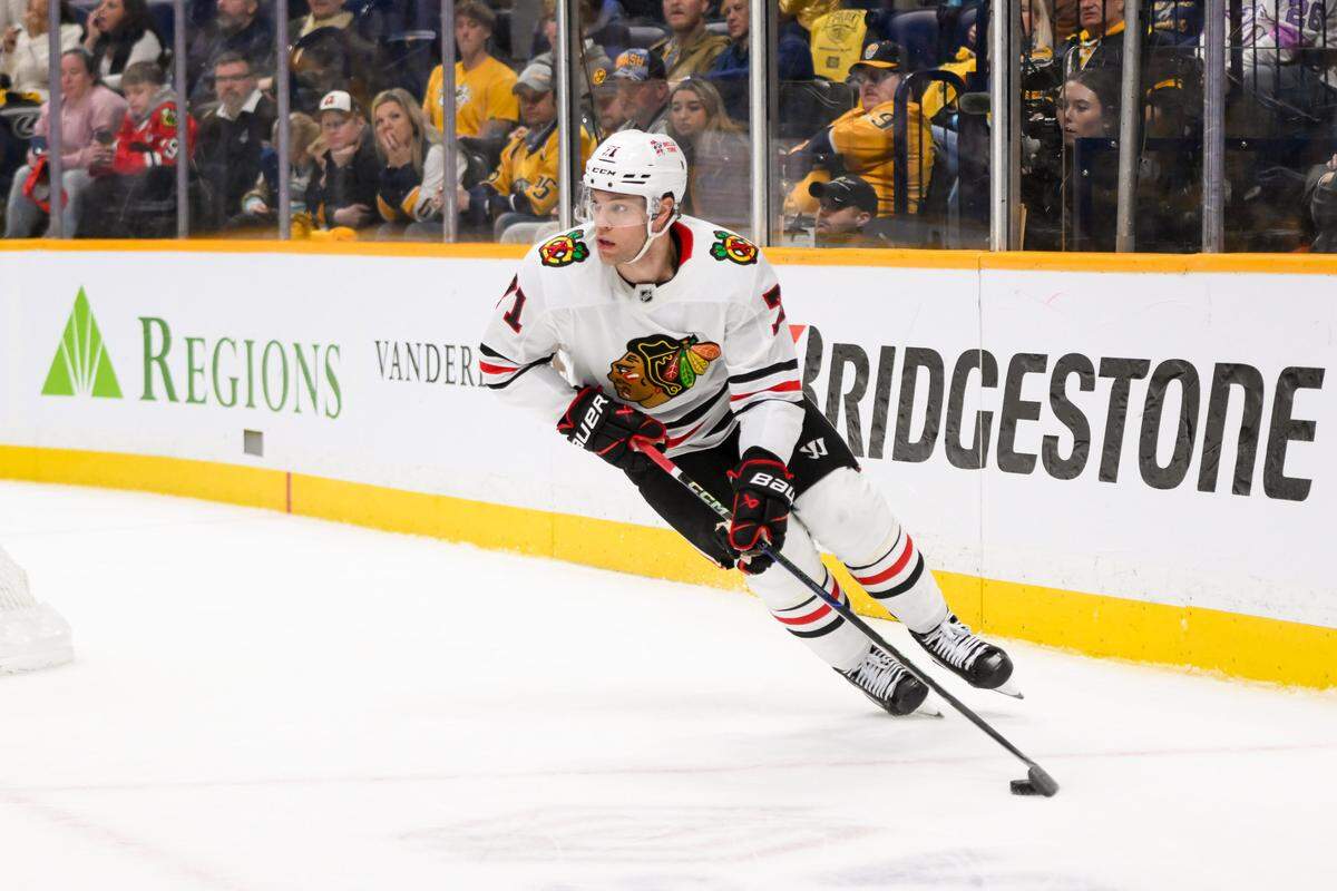 Chicago Blackhawks left wing Taylor Hall (71) skates with the puck against the Nashville Predators during the overtime period at Bridgestone Arena.