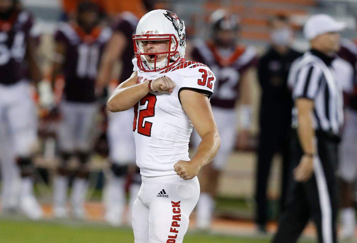 N.C. State place kicker Christopher Dunn (32) celebrates making a 53-yard field goal during the first half of N.C. State’s game against Virginia Tech at Lane Stadium in Blacksburg, VA Saturday, Sept. 26, 2020.