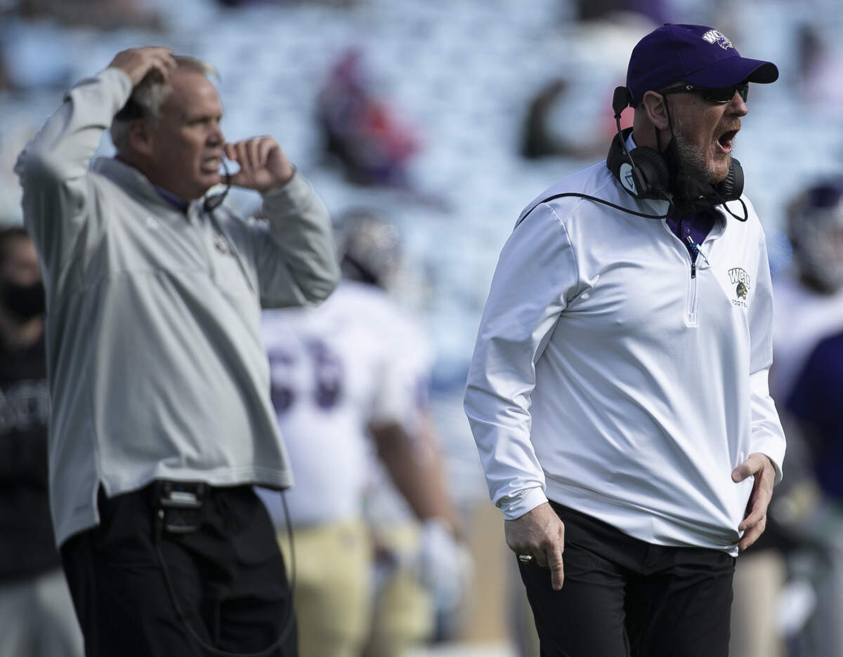 Western Carolina head coach Mark Speir yells directions to his team in the second quarter against North Carolina on Saturday, December 5, 2020 at Kenan Stadium in Chapel Hill, N.C.