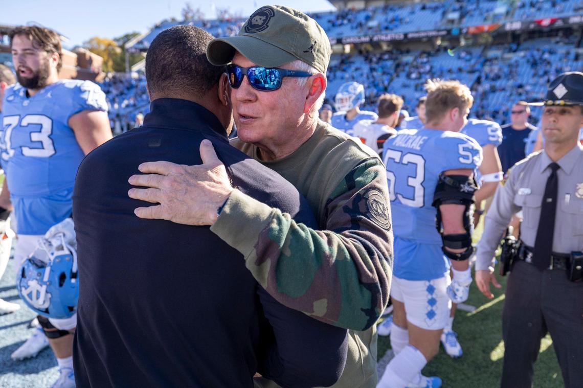 Campbell coach Mike Minter congratulates North Carolina coach Mack Brown following the Tar Heels’ 59-7 victory on Saturday, November 4. 2023 at Kenan Stadium in Chapel Hill, N.C.