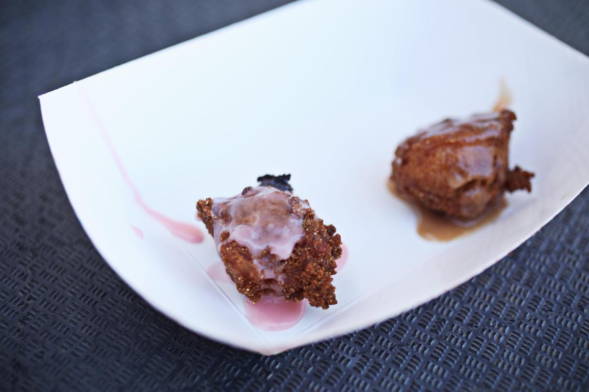 The candied apple hushpuppy with Cheerwine sugar glaze from Ragin Cajun.