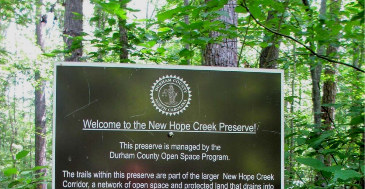 A sign in the New Hope Creek corridor in Durham. Environmental groups have raised flags over the years about development near where the creek crosses U.S. 15-501 in Durham.