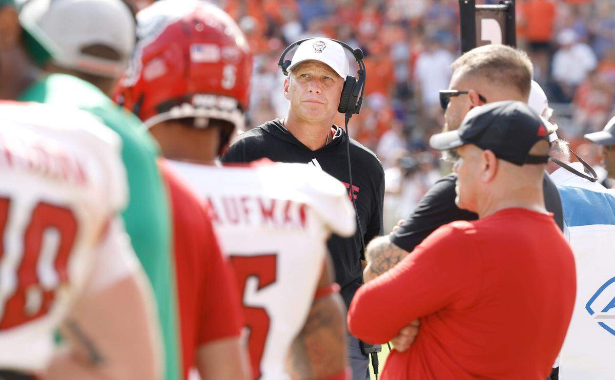 N.C. State head coach Dave Doeren looks up at the scoreboard during the second half of Clemson’s 59-35 victory over N.C. State at Memorial Stadium in Clemson, S.C., Saturday, Sept. 21, 2024.