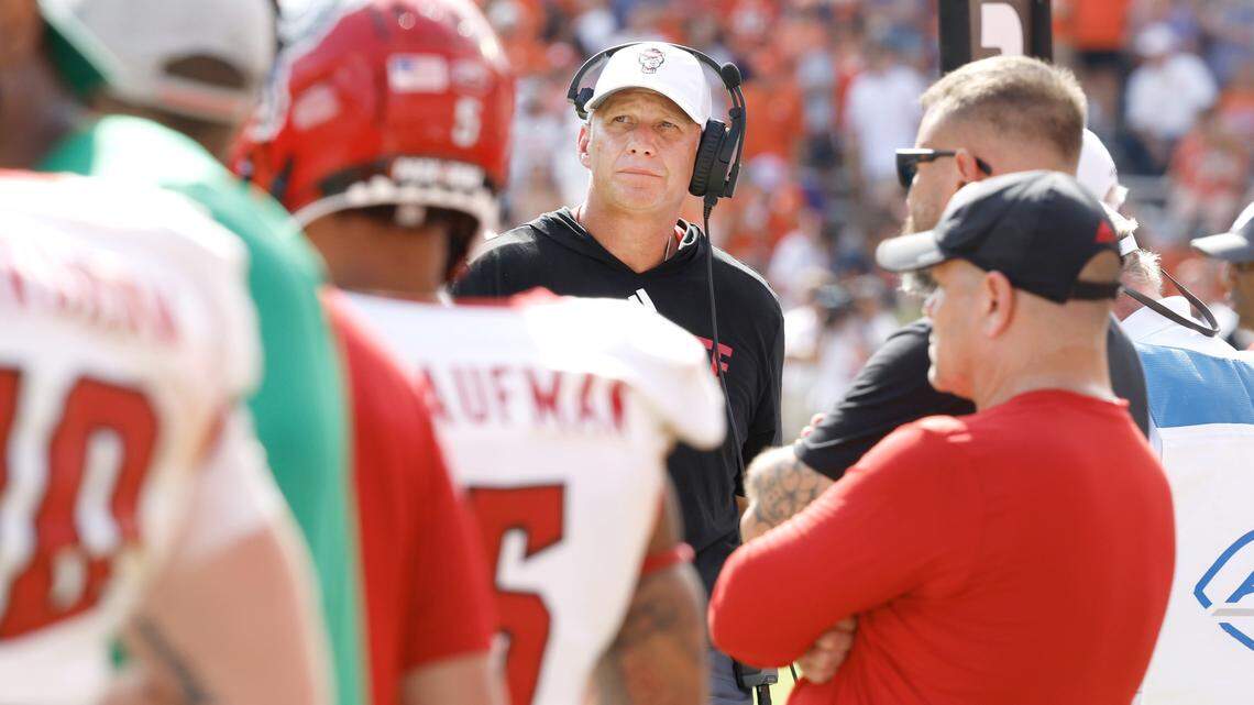 N.C. State head coach Dave Doeren looks up at the scoreboard during the second half of Clemson’s 59-35 victory over N.C. State at Memorial Stadium in Clemson, S.C., Saturday, Sept. 21, 2024.