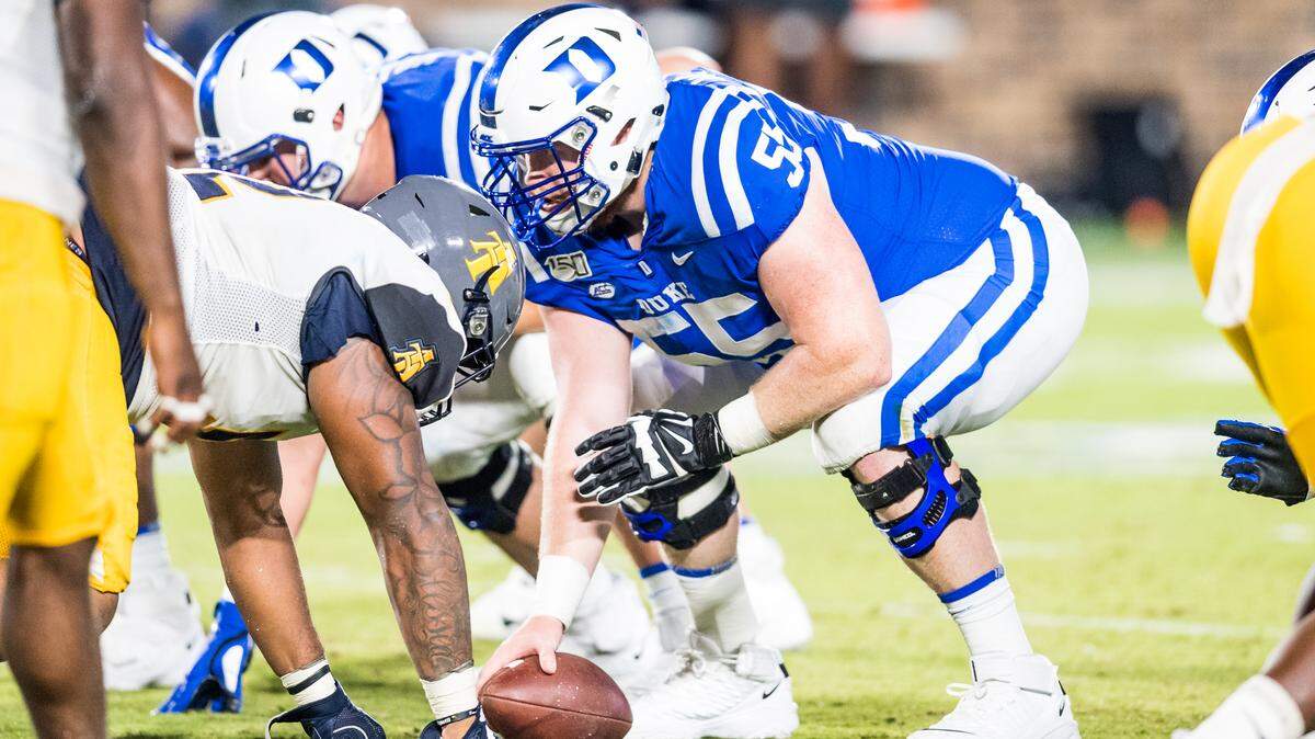 Duke football center Will Taylor readies to snap the ball in a game with North Carolina A&T at Wallace Wade Stadium on Sept. 7. 2019. After a nerve injury nearly ended his playing career, Taylor gets his first start against Syracuse.
