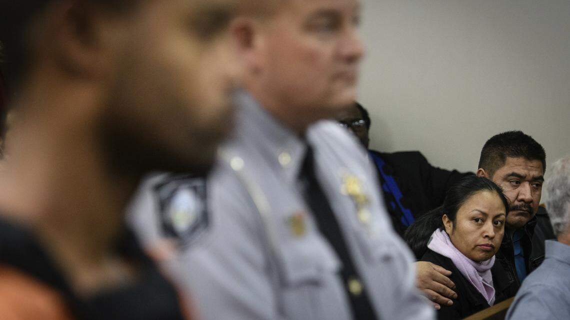 Celsa Maribel Hernandez Velasquez , mother of Hania Aguilar, stares at Michael Ray McLellan, 34, during his first appearance for the kidnapping and murder of Hania Aguilar on Monday, Dec. 10, 2018, in Lumberton, N.C. (Andrew Craft/The Fayetteville Observer via AP)
