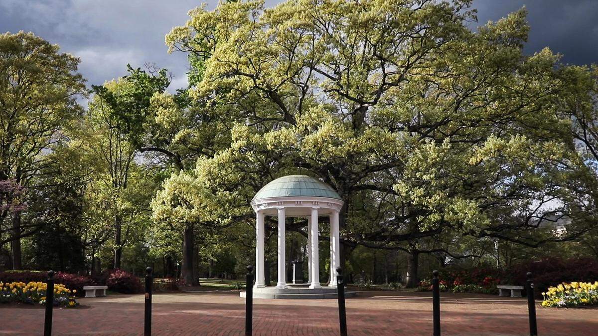 The Old Well on UNC-Chapel Hill’s campus is without its usual spring-time visitors on the evening of April 1, 2020.