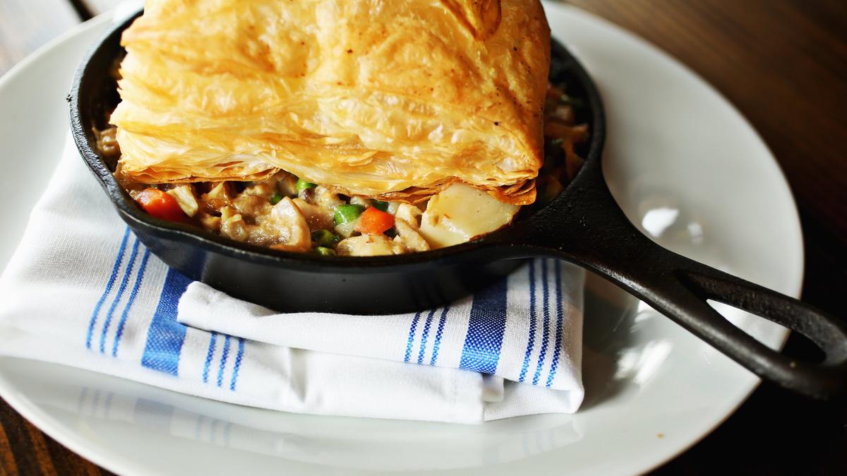 Breakaway Cafe in Chapel Hill has a chicken veggie pie - a miniature cast iron skillet filled to the brim with succulent shreds of chicken, assorted vegetables and just enough gravy to hold them together and topped with an airy pillow of puff pastry.