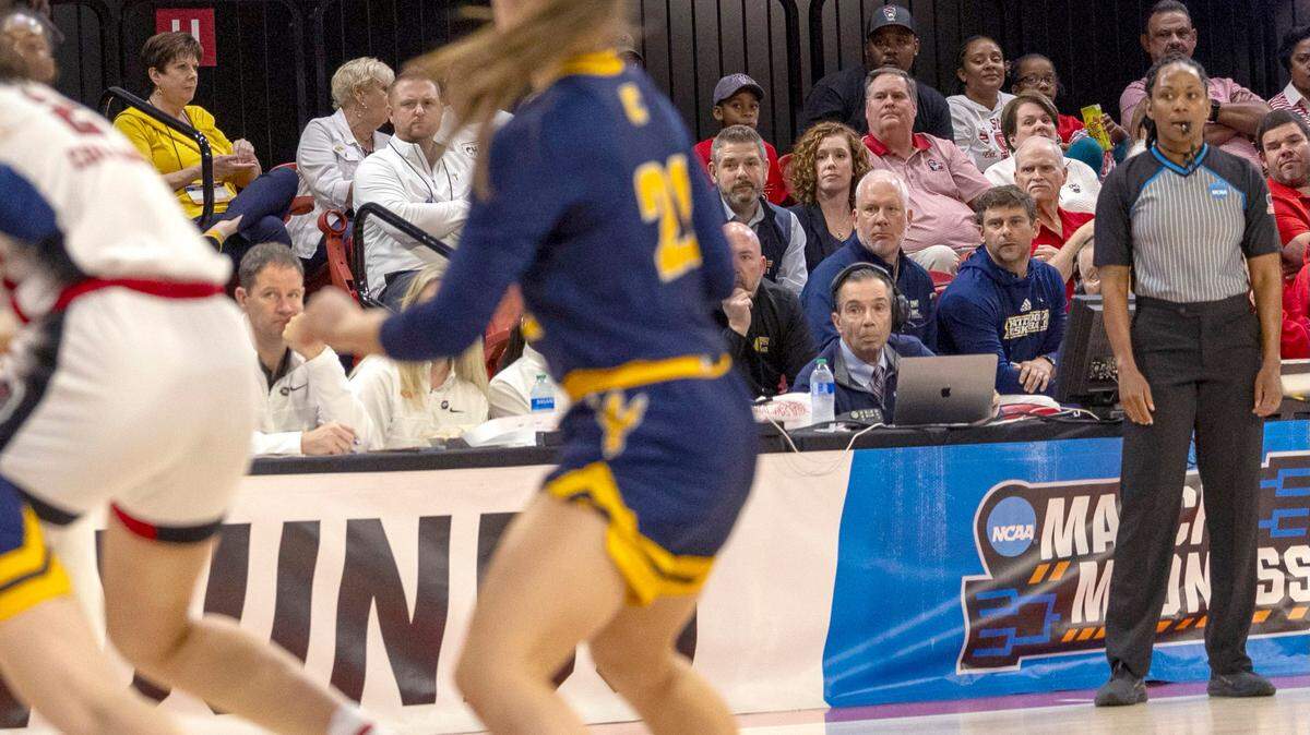 Official Tommi Paris, right, works in the first half of N.C. State’s game against Chattanooga in the first round of the NCAA Division I Women’s Basketball Championship at Reynolds Coliseum in Raleigh, NC on Saturday, March 23, 2024.