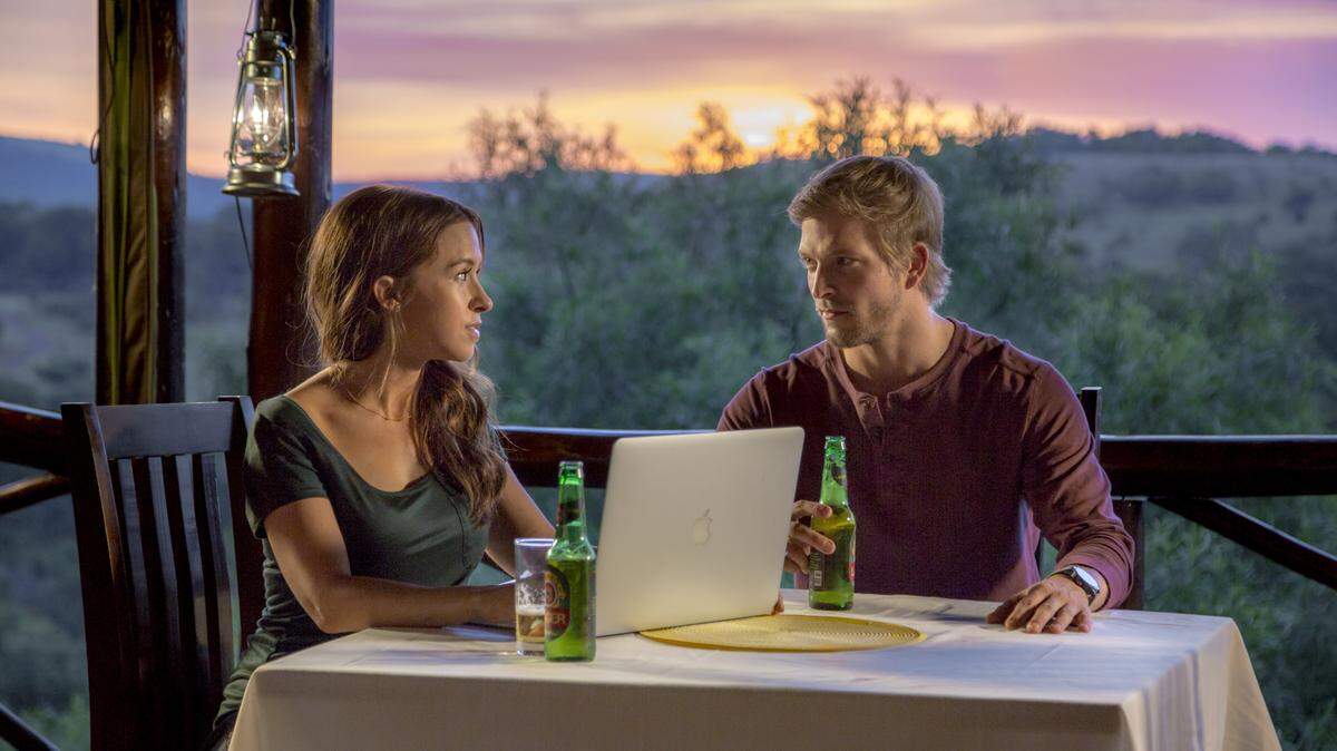 Lacey Chabert, left, and Jon Cor in the Hallmark Summer Nights movie "Love on Safari."