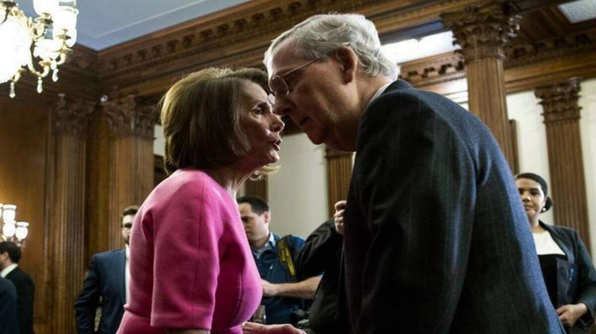 In this file photo, Mitch McConnell and Nancy Pelosi confer after Congress wrapped up it’s 2016 session. Pelosi, a Democrat, is now Speaker of the House and McConnell, a Republican, is Senate Minority Leader.