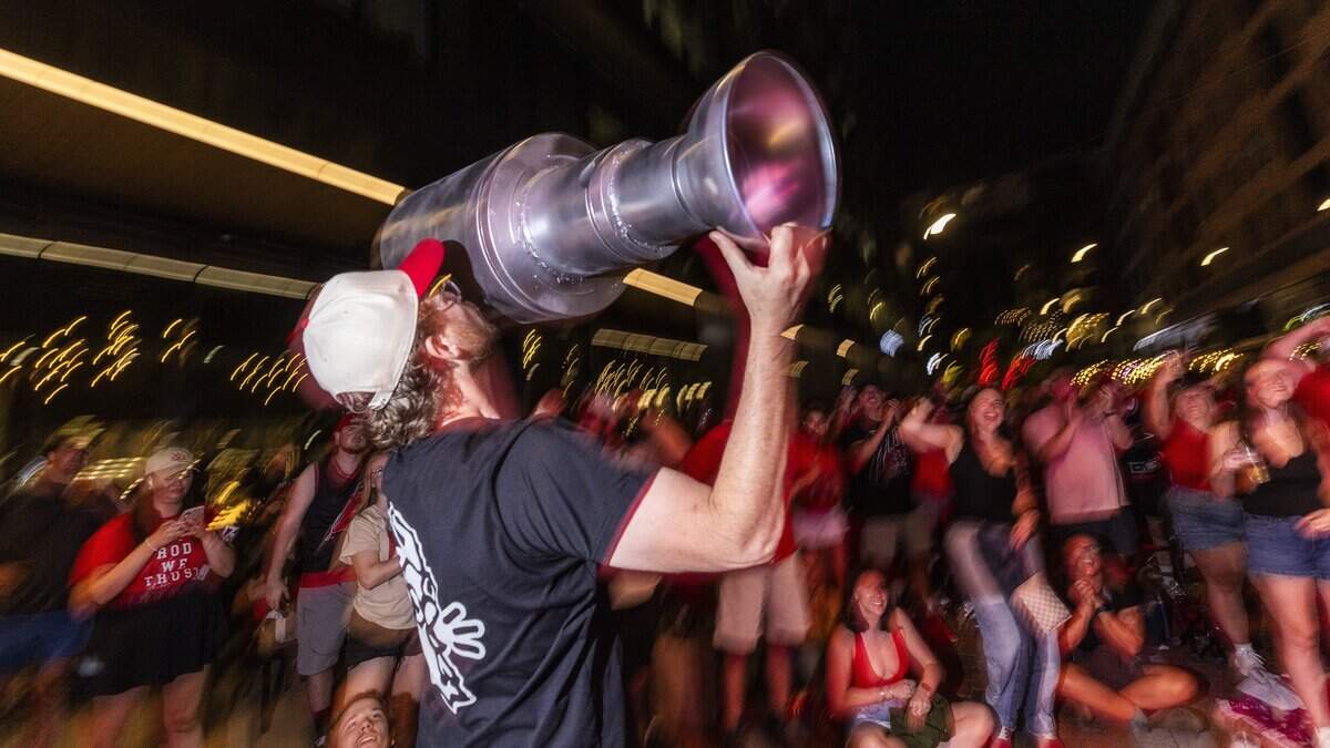 Carolina Hurricanes fans celebrate the team's Stanley Cup victory over the Vegas Golden Knights in Las Vegas in Raleigh's Smoky Hollow district on Sunday, June 14, 2026. The Hurricanes last won the Stanley Cup in 2006.