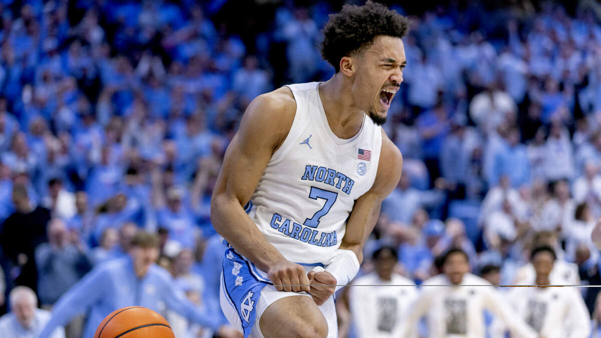 North Carolina guard Seth Trimble (7) reacts after a break away dunk in the second half against Louisville on Monday, February 23, 2026 at the Smith Center in Chapel Hill, N.C. Trimble led all scores with 30 points in the Tar Heels’ 77-74 victory.