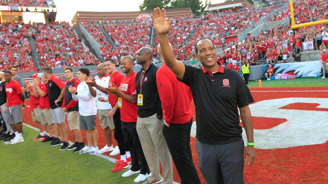 N.C. State basketball coach Kevin Keatts and the team are introduced during a timeout in the first half of N.C. State’s game against Marshall at Carter-Finley Stadium in Raleigh, N.C., Saturday, Sept. 9, 2017.