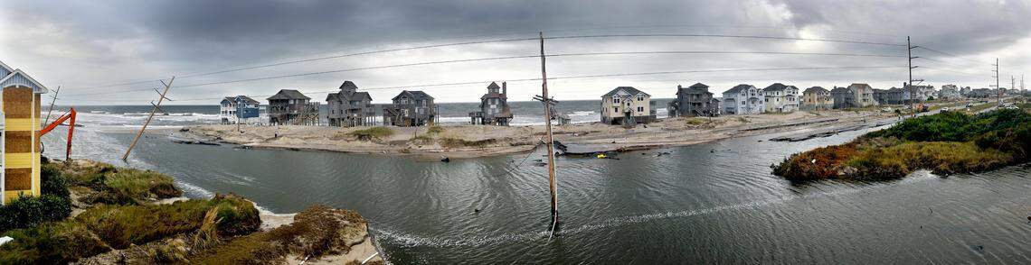 A panorama of the damage at the north end of Rodanthe, N.C.Tuesday, August 30, 2011 on Hatteras Island on the North Carolina Outer Banks from Hurricane Irene. The storm cut through the island at this point, washing out N.C. Highway 12.  Remnants of the road can be seen at the upper right of the photograph.  The panorama is made from seven photos combined.  