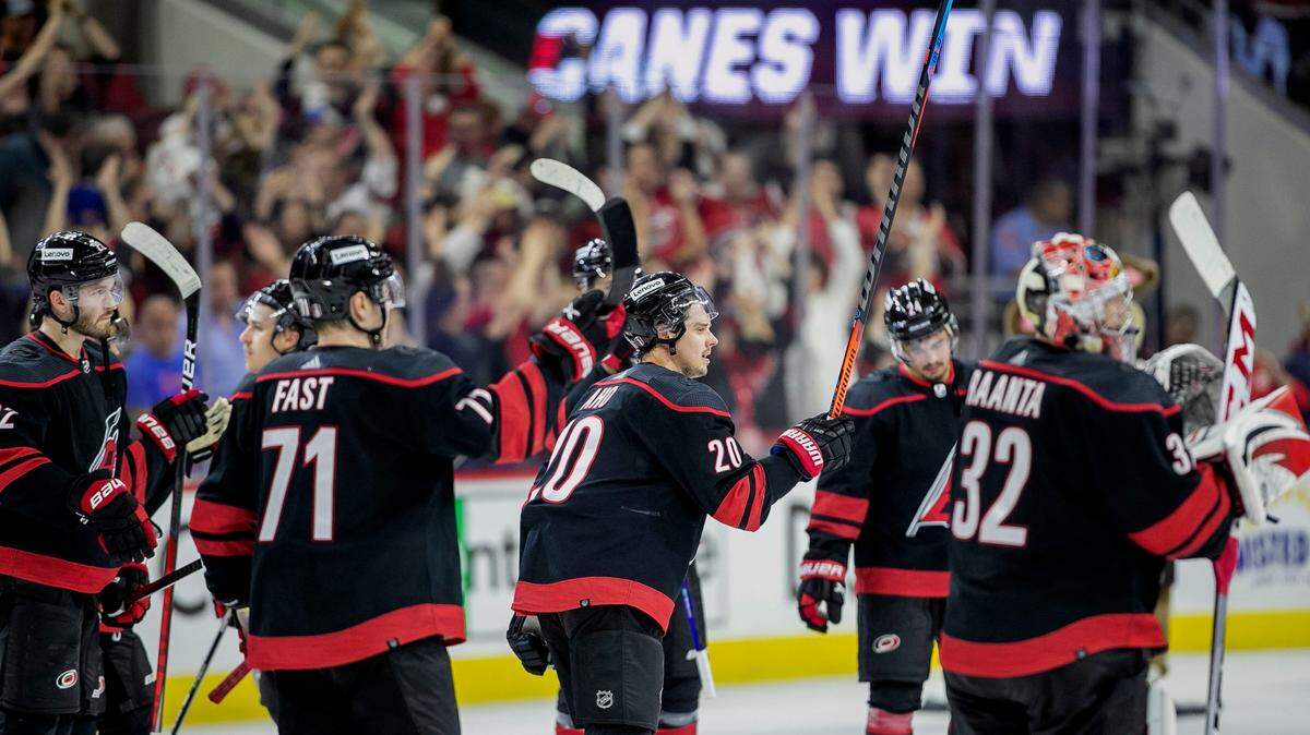 Carolina Hurricanesí Sebastian Aho (20) and his teammates celebrate their 2-0 victory over the New York Rangers on Friday, May 20, 2022 during game two of the Stanley Cup second round at PNC Arena in Raleigh, N.C.