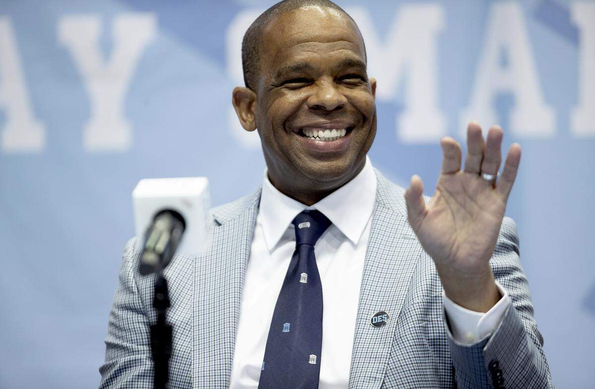 Hubert Davis is introduced at the new men’s basketball coach at the University of North Carolina on Tuesday, April 6, 2021 at the Smith Center in Chapel Hill, N.C. Davis a former North Carolina player and an assistant coach for Roy Williams, replaces Williams who retired last week following 18 years as head coach.