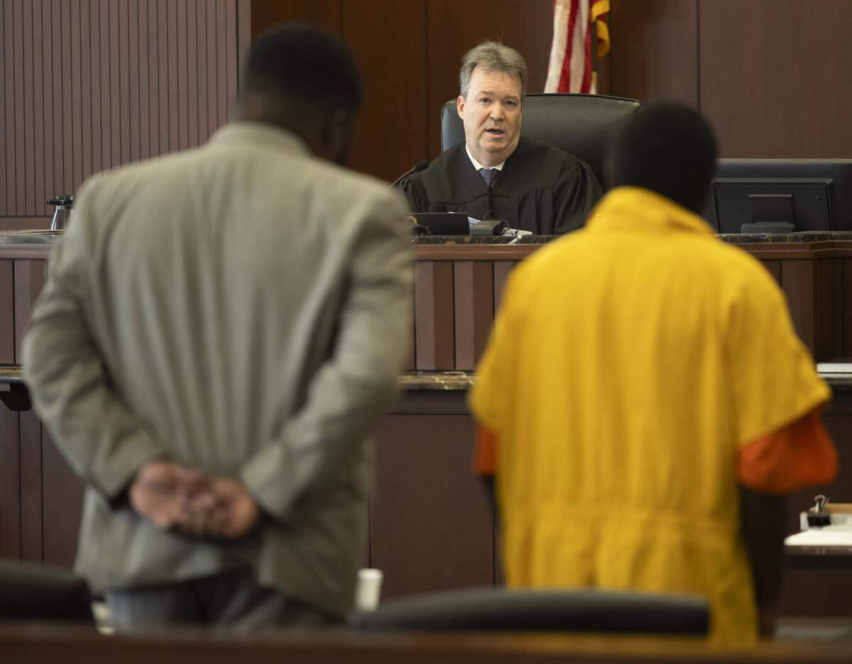 Superior Court Judge Paul Holcombe sentences Cedric Jamal Kearney to a minimum of 10 years and 10 months and a maximum of 14 years in prison on Friday, September 12, 2025 in Raleigh, N.C. He’ll additionally serve 21 years in federal prison on the federal charges.