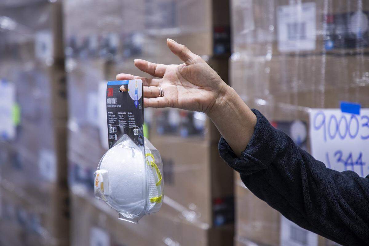 About 10,000 of these masks were donated by SamaritanÕs Purse at the UNC Health Shared Services Center, which distributes supplies to the system’s 11 hospitals, to address the expected shortage of protective equipment for health care workers who will be treating coronavirus patients in the coming weeks, on Wednesday, Mar. 25, 2020, in Durham, N.C.