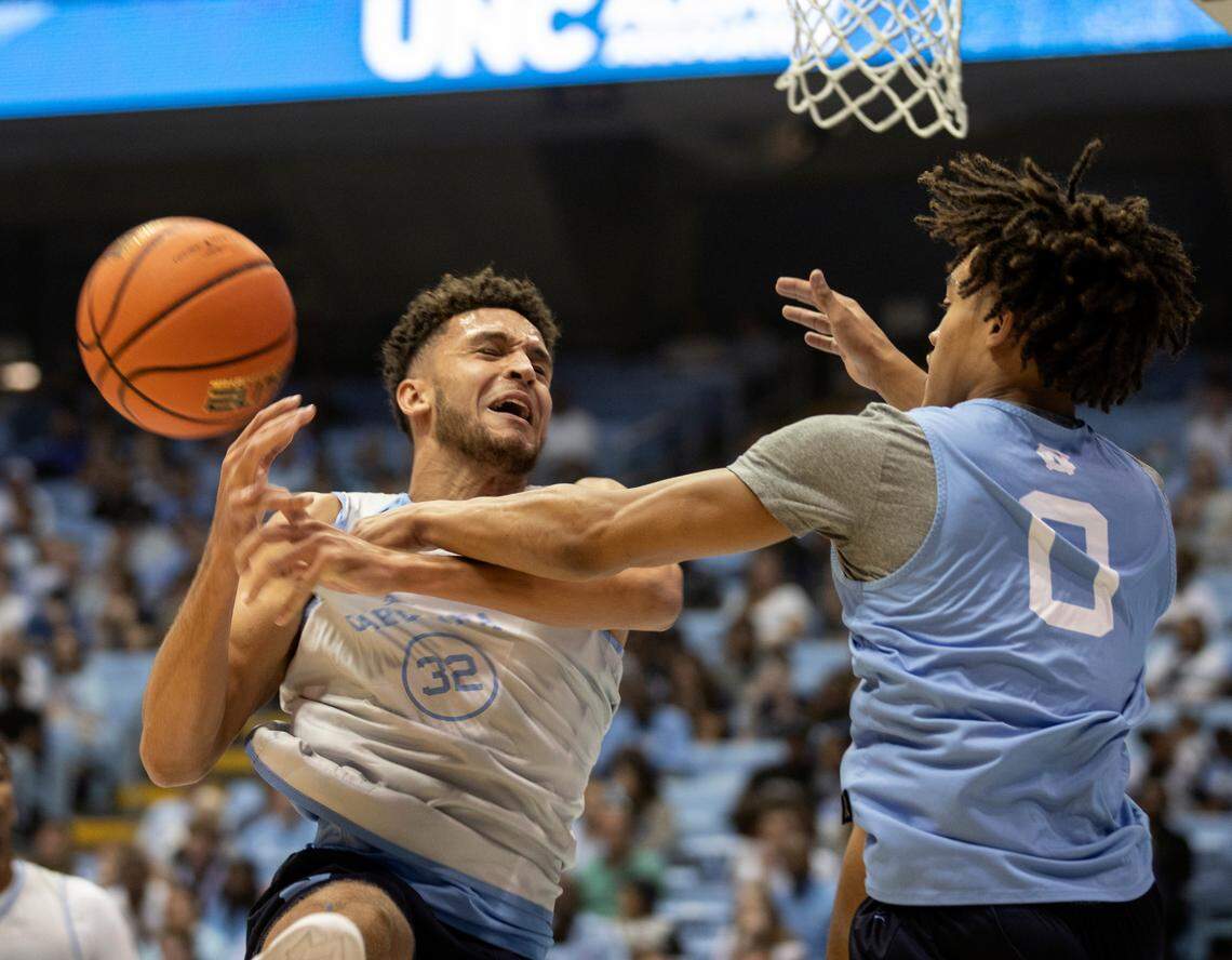 North Carolina’s Pete Nance is fouled by Seth Trimble during a scrimmage at “Live Action with Carolina Basketball” at the Dean E. Smith Center on Friday, Oct. 7, 2022, in Chapel Hill, N.C.